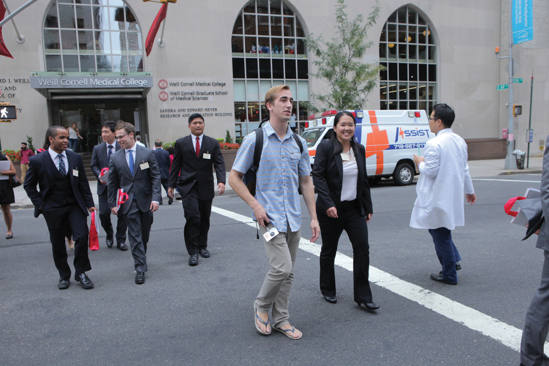 Tour guide: Ryan Walsh '19 (in blue shirt) shows prospective medical students around campus.