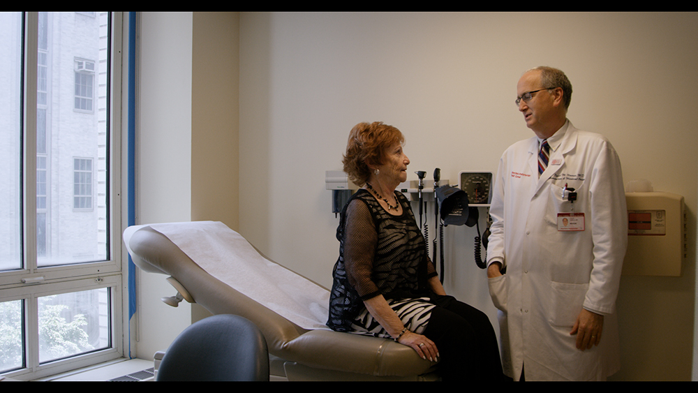 Dr. David Nanus speaks with his patient, Irene Price.