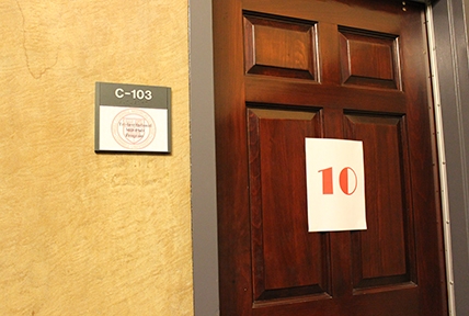A sign outside the Tri-Insitutional M.D. - Ph.D. Program's office door announces its perfect score of 10 in the Medical Scientist Training Program grant renewal.