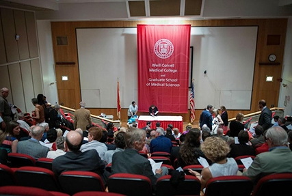 Dr. Carol Storey-Johnson prepares for convocation in Uris Auditorium