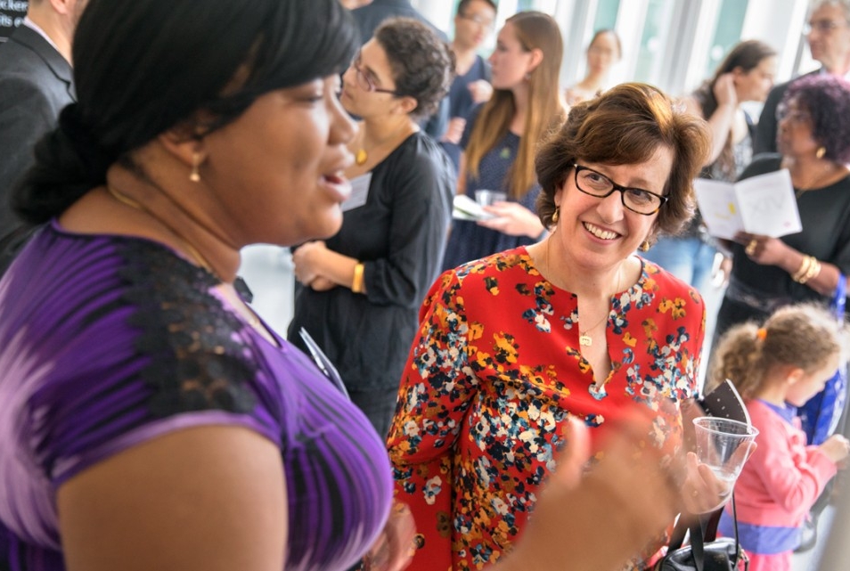 President Martha E. Pollack visits with a student presenter during the Festival of Scholarship, Aug. 24 in the Physical Sciences Building Atrium. The festival kicked off three days of events that include the Aug. 25 inauguration of Pollack as Cornell’s 14th president.