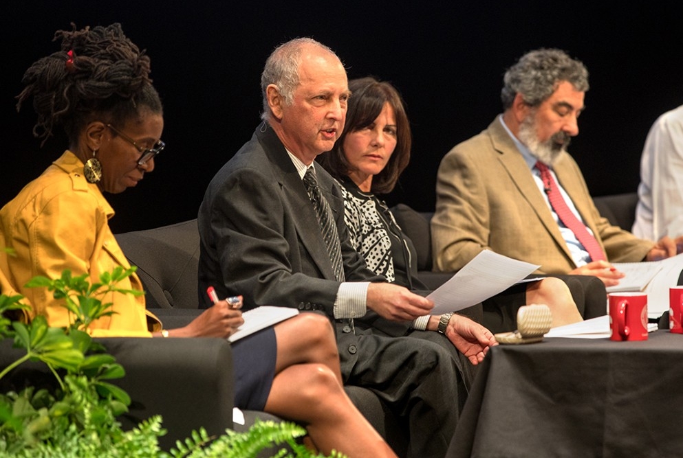 David Shalloway speaks at the symposium. Others from left, are Lyrae Van Clief-Stefanon, Holly Prigerson, Bruce Lewenstein, and Mor Naaman.