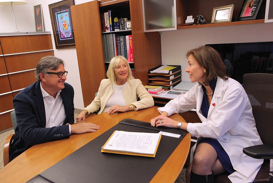 Dr. Erica Jones with patients Alain and Marialuisa Baume.