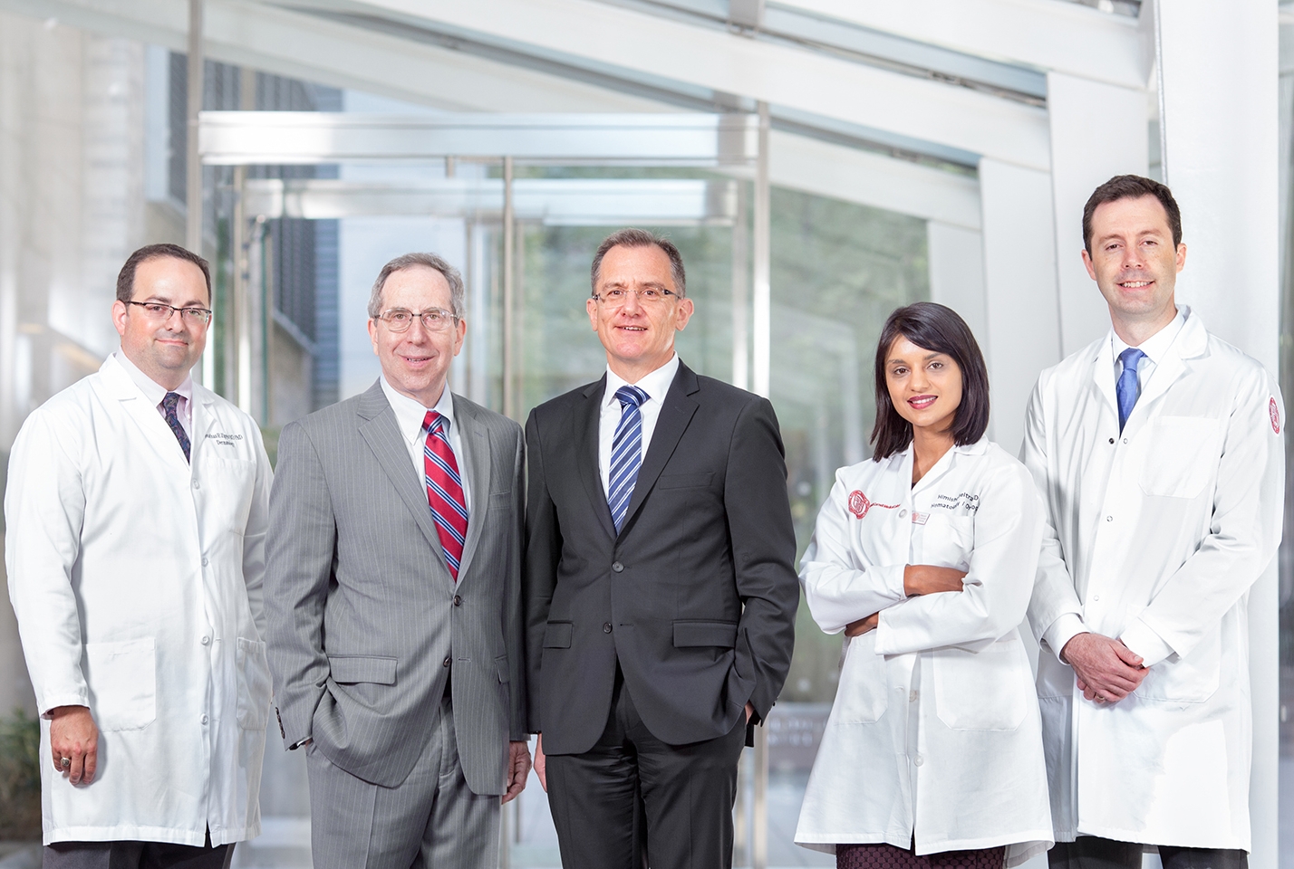The Englander Institute’s expanded program will target additional areas of oncology including melanoma, a rare but serious form of skin cancer. Front left, Chair of Dermatology Dr. Richard Granstein, and front right, Englander Institute Director Dr. Mark Rubin. In white coats, from left, physician-scientists Drs. Jonathan Zippin, Himisha Beltran and Olivier Elemento. Photo credit: Jason Andrew/Getty Images/WCMC