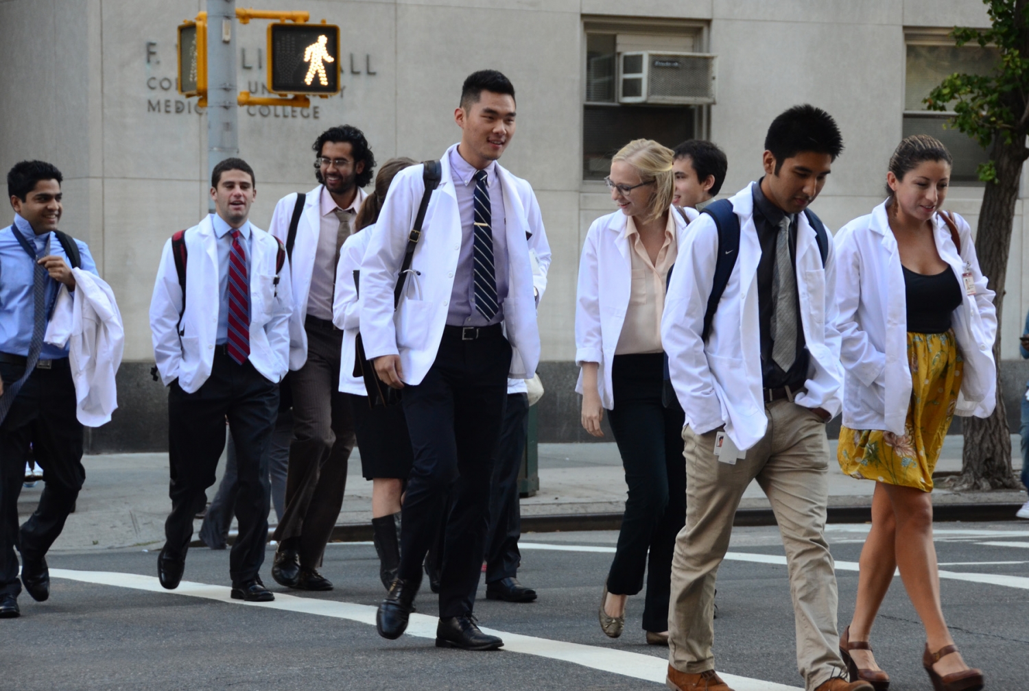 Students in the Weill Cornell Class of 2016 walk to class wearing their white coats Photo credit: Julie Kim-Einiger