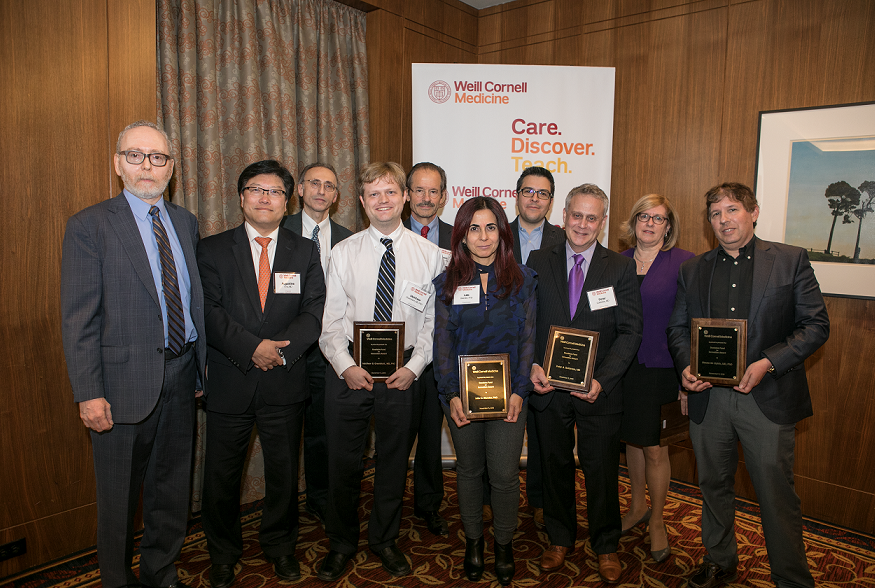 Dr. Augustine M.K. Choi, the Stephen and Suzanne Weiss Dean of Weill Cornell Medicine (second from left), and Larry Schlossman, managing director of BioPharma Alliances and Research Collaborations at Weill Cornell Medicine (first from left), join the winners of the Daedalus Fund for Innovation. From third from left: Dr. Shahin Rafii, Dr. Matthew Greenblatt, Dr. Lew Cantley, Dr. Julie Blander, Dr. Juan Cubillos-Ruiz, Dr. Peter Goldstein, Dr. Barbara Hempstead and Dr. Steven Lipkin. 