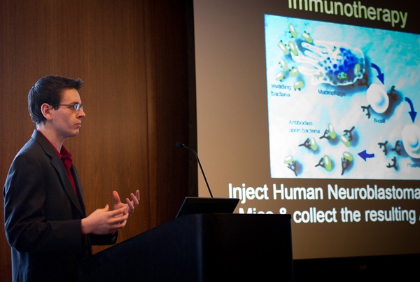 Bryan Iorgulescu speaking on neuroblastoma metastasis at Medical Student Research Day, Feb. 23.