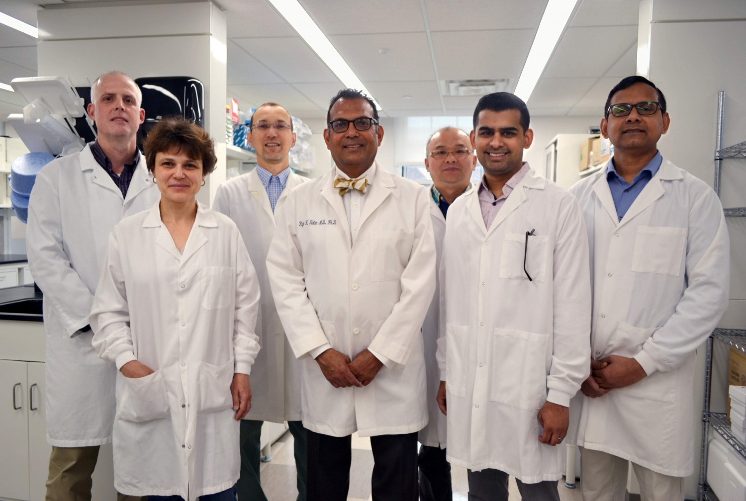 Dr. Rajiv Ratan (center) and his research team at the Burke Neurological Institute.