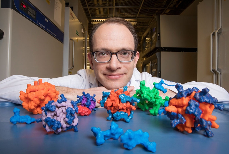 Particle Man: Chemist Daniel Heller with 3-D-printed models of his cancer-fighting nanoparticles.
