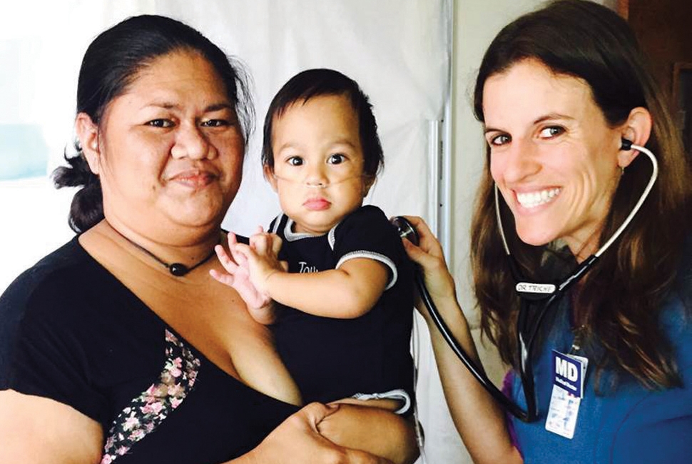 Dr. Elizabeth Triche with patient Jazzy and mom