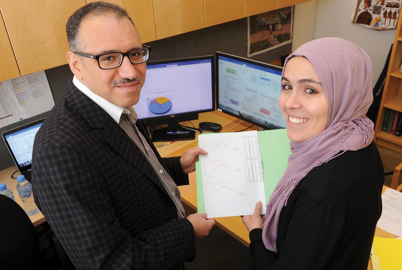 Dr. Laith Abu-Raddad (left), and Susanne Awad. Photo credit: The Qatar Foundation