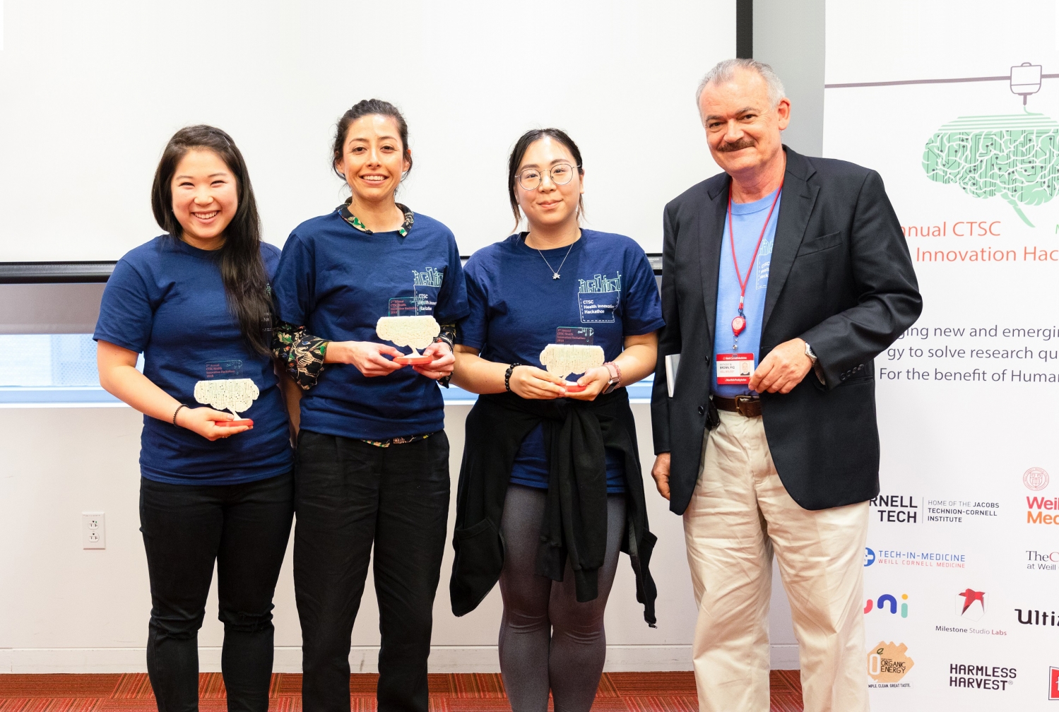 From left: Flora Baik of Weill Cornell Medicine and MSKCC fellows Daly Avendano and Shu Lei alongside Dr. Anthony Brown, the co-director of the CTSC TL1 training program at the second annual Health Innovation Hackathon
