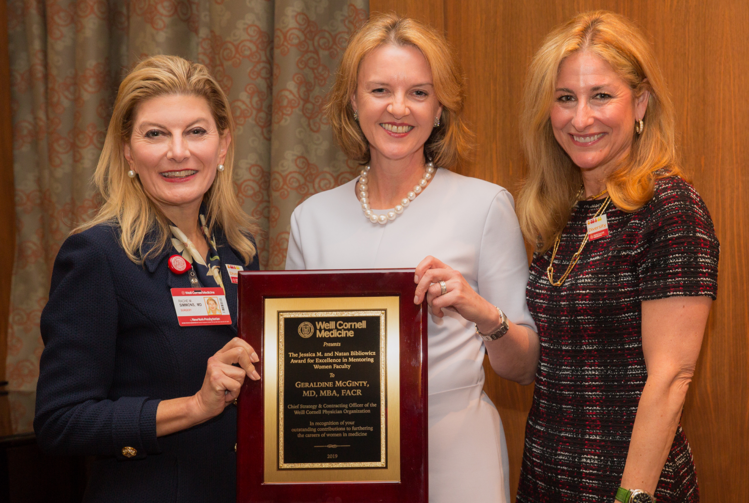 Dr. Geraldine McGinty accepts the 2019 Jessica M. and Natan Bibliowicz Award for Excellence in Mentoring Women Faculty from Jessica Bibliowicz and Dr. Rache Simmons. Credit: Ashley Jones