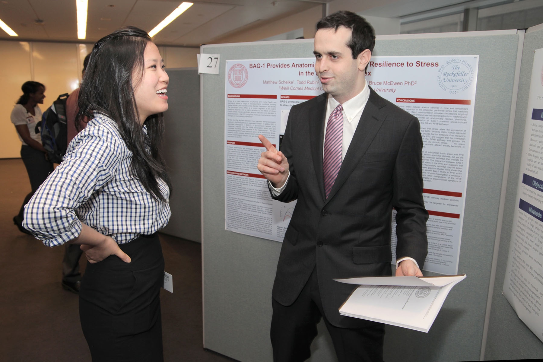 Angela Jia and Matthew Schelke chat between sessions at Medical Student Research Day.