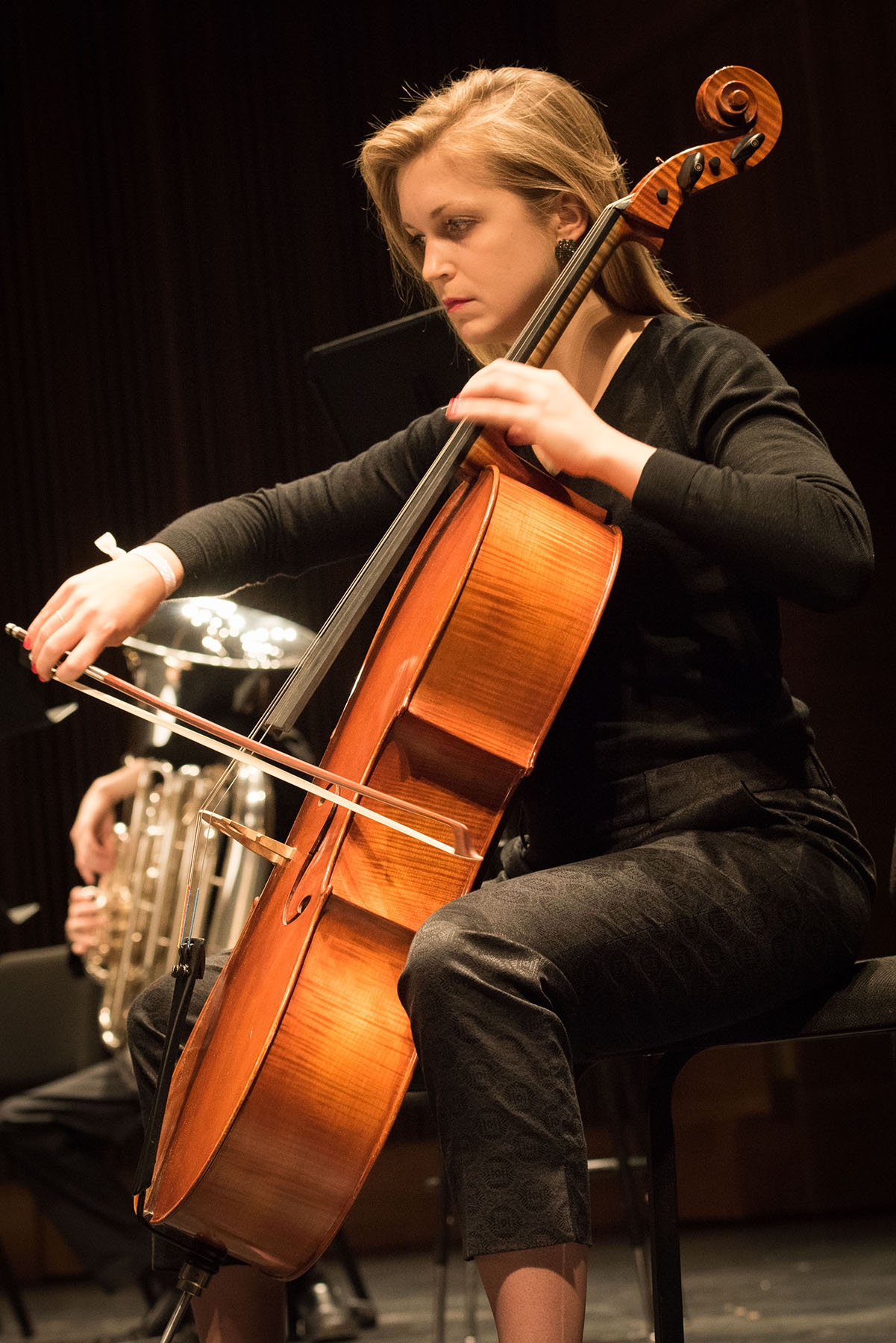 Physician assistant student Laura Radlinski practices her cello before the spring Music and Medicine Initiative concert. Physician assistant student Laura Radlinski practices her cello before the spring Music and Medicine Initiative concert.