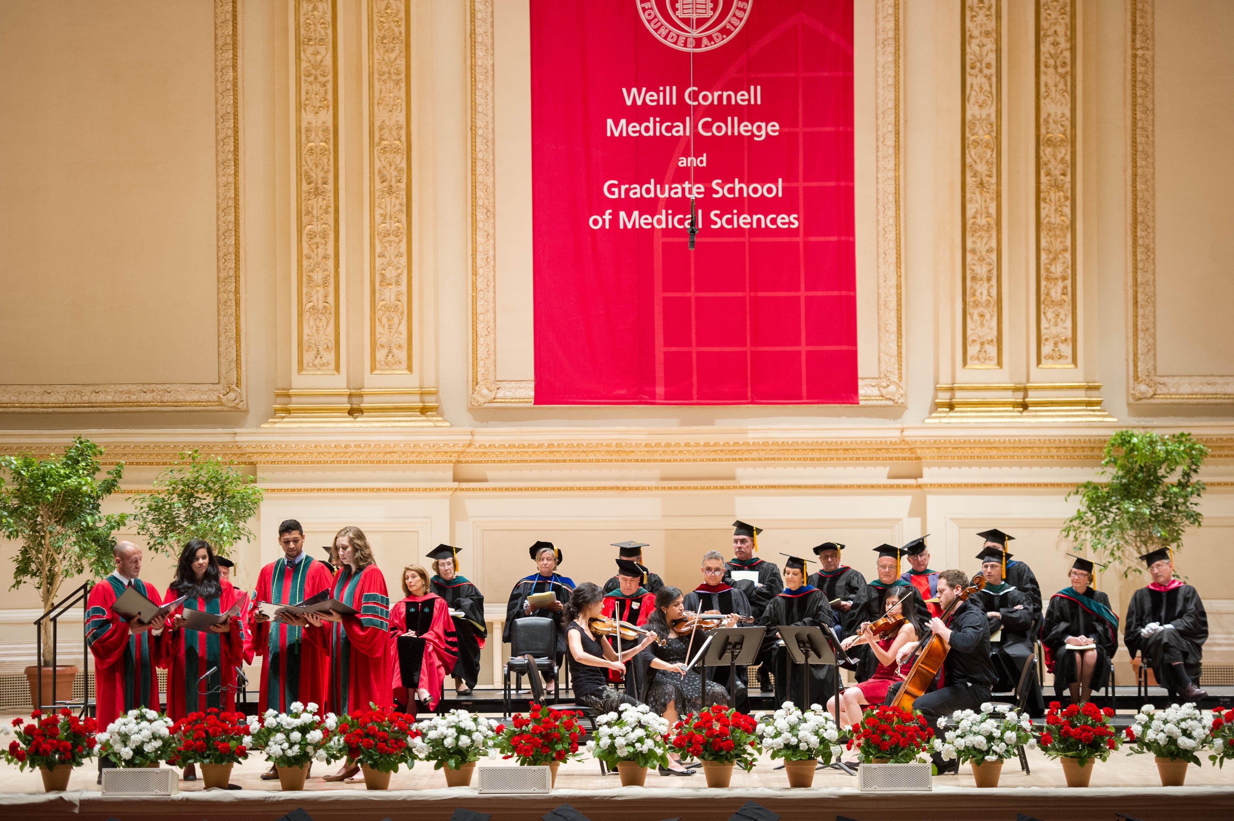 Weill Cornell Music and Medicine students perform original music, "Iuro Per Quod," at commencement