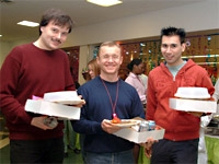 Sergey Shmelkov, Hans-Georg Kopp and Scott Avecilla enjoy dinner at the Garden Café.
