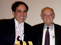 Dr. Frank Chervenak receiving the Erich Saling Perinatal Prize from Dr. Erich Saling