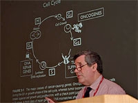 Dr. Fred Gilbert lectures teachers on genetic disease and the ethical dilemmas faced by physicians.