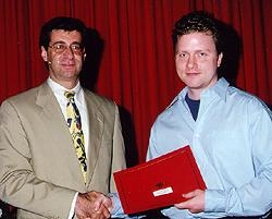 Chad May, winner of the Julian R. Rachele Prize, with Dean Hajjar.