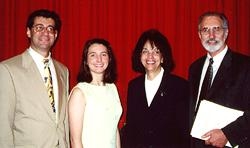 Joan Adamo, recipient of the 2001 Distinguished Student Commencement Speaker Award, with Dean Hajjar, Francoise Freyre and Dr. Joel Pardee