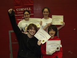 Seventh-grade students Sarah Paliani, Cara Gerstle, Daniel Filstein and Ruslan Pantaev were winners in the 2002 Cornell Science Challenge's Best Scientific Method category for their presentation, "Cat Grass Cacophony."