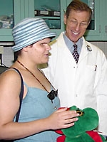 Abbey White with "Dino" and Dr. David Abramson.