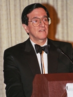 Dr. John Savarese accepts his award at the 2005 Greenberg Award dinner.