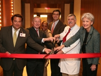 Cutting the ribbon to open the brand-new Griffis Faculty Club: William Greene, Dr. Antonio M. Gotto Jr., Taasha Ramsay...