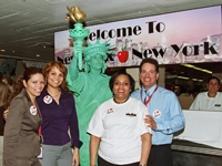 Weill Cornell staff gather around a NYC icon as they enter the Garden Café for Employee Appreciation Day.
