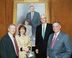 Joan and Sanford Weill, Dean Antonio Gotto and Cornell President Hunter Rawlings with the portrait presented at the reception