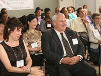 Brenda and Donald Tobias with faculty and staff from Weill Cornell viewing the live broadcast from Cornell's 34th Street satellite office