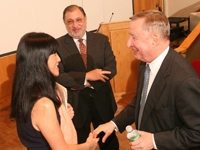 Dr. Gotto and Steven Rosalie meet with faculty, including Dr. Selina Chen-Kiang, following the address.