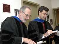 Drs. Joel Pardee and David Hajjar prepare to confer degrees to the Class of 2005