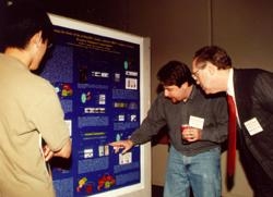 Graduate student Matthew Gamble discusses his poster exhibit with Dr. Daniel Gardner