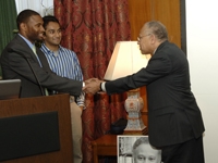 students Dennis Spencer and Ankit Patel wish Dr. Ballard a fond farewell.