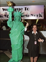 A WMC staff member mimics a "living" statue brought into the Garden Café to complete the "New York, New York" theme.