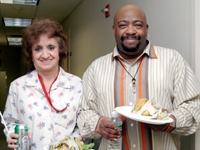 Frances Jorr and Robert Spivey prepare for food and drink