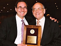 Dr. Jack Barchas, recipient of the 2004 American Psychiatric Association Award for Research in Psychiatry, with his son Isaac