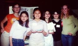 Cornell Science Challenge winners in both the "Best Scientific Method" and "People's Choice" categories with their mentor Julie Miller