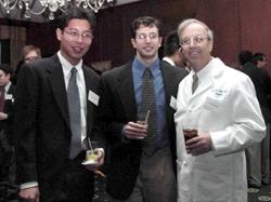 First-year students Howard Hsu and Jonathan Austrian chat with Dr. John Daly, chairman of the Department of Surgery.