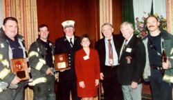 Firefighters from Engine 44 were among many local firefighters and police officers whose heroic efforts were recognized at the "Honoring Our Community" reception. From left: Firefighter Edward Kennedy; Firefighter Richard Boeri; Lt. Kevin Rice; Dr. Lisa S