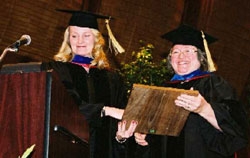Dr. Bonnie Mathieson receives the Graduate School's Alumni Award of Distinction, presented by Dr. Kathleen Scotto, '83, chairperson of the school's Alumni Committee.