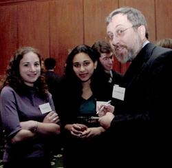 First-year students Jen Scherer and Malika Seth speak with Dr. Paul Miskovitz, clinical associate professor of medicine and president of the Cornell University Weill Medical College Alumni Association.