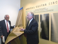 Dr. Roger Yurt and Dr. Mark Pasmantier unveil the Medical Center Circle Donor Wall