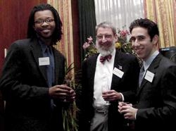 First-year students Mustapha Saheed and Jonathan Kazam speak with Dr. Joseph Hayes