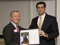 Dr. Gotto is presented with a gift from Dr. Hajjar commemorating his 10th year as dean of Weill Cornell.