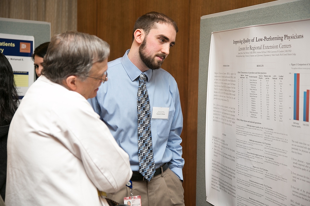 Samuel Boas presents his research to Dr. Oliver Fein