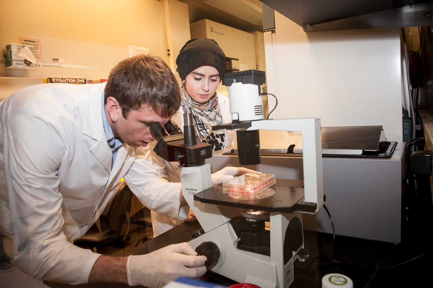 Weill Cornell researcher David Havlicek with scholarship winner Hessa Khalid Al-Hail David Havlicek and Hessa Khalid Al-Hail