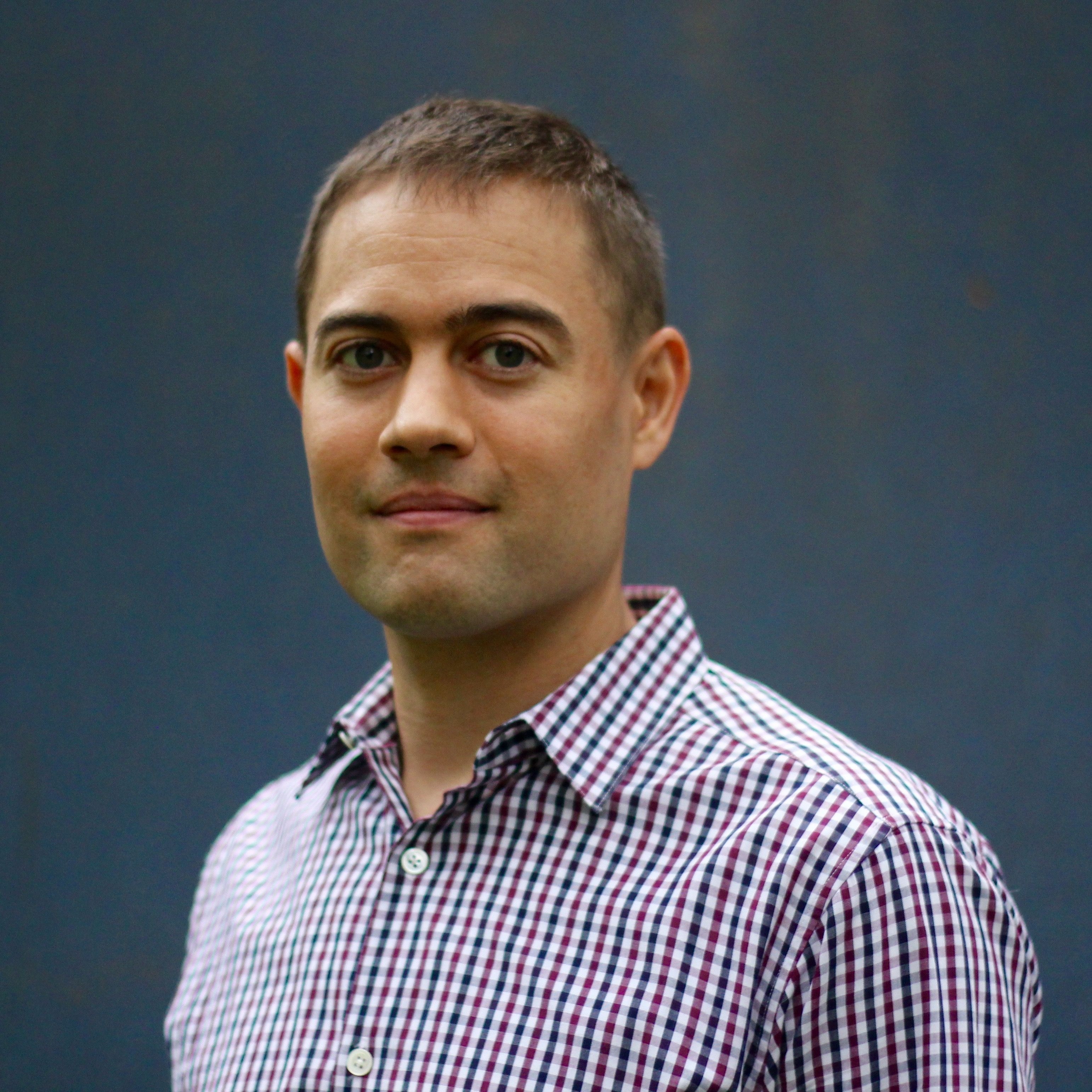 photo of a man on a blue background